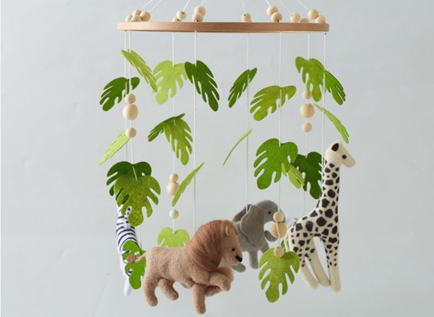 mobile musical bébé jungle feutre feuilles lion éléphant giraffe zèbre