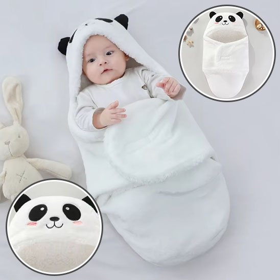 nid d'ange noir blanc panda tête beébé éveillé peluche lapin à côté