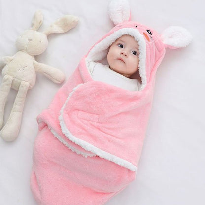 nid d'ange rose blanc lapin bébé éveillé peluche lapin à côté
