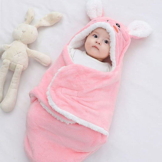 nid d'ange rose blanc lapin bébé éveillé peluche lapin à côté