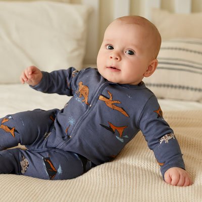 pyjama bébéb motifs dinosaures fond bleu foncé