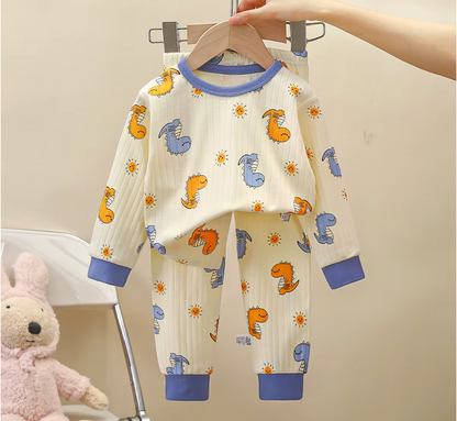 pyjama bébé motifs dinosaures jaune bleu fond blanc crème