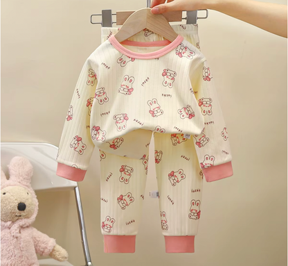 pyjama bébé motifs lapins rose fond blanc crème