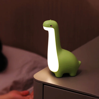 veilleuse bébé dinosaure vert table de chevet enfant dort